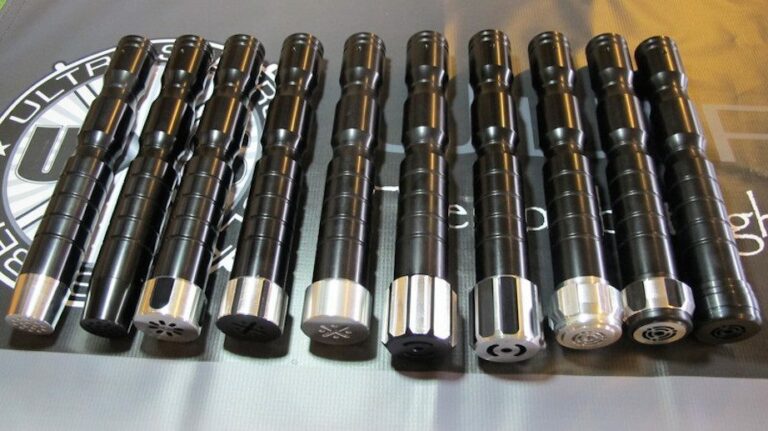 Here is a picture of the Dark Initiate v3 with some of our MHS compatible pommels for the Dark Prophecy v3. From left to right: Catalyst, Dark Catalyst, Bellicose Long Grooves, Raven SS, Raven Plain, Dark Warglaive 2, Dark Warglaive, Arbiter, Archon, Consular pommels.