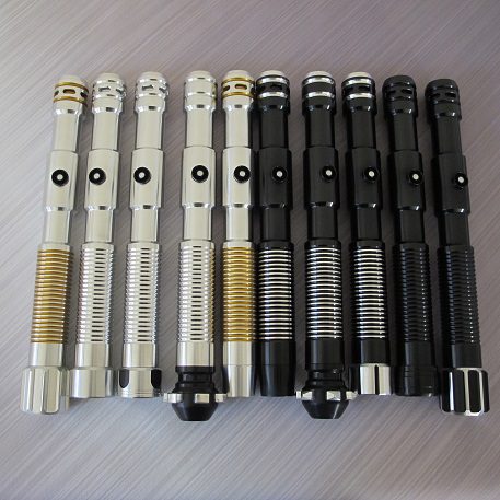 Here is a picture with some of our MHS compatible pommels (from left to right: Warglaive, Raven Normal, Bellicose Short Groove, Guardian, Catalyst, Dark Catalyst, Scorpion, Raven SS, Consular, Dark Warglaive pommels)