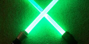 Two Crossed Green Lightsabers