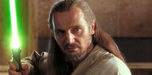 Qui-Gon Jinn Holding a Green Lightsaber